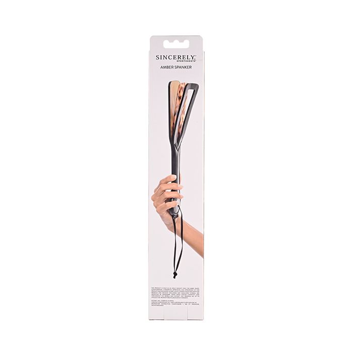 Sincerely Amber Spanker Luxury Toy on a silk backdrop